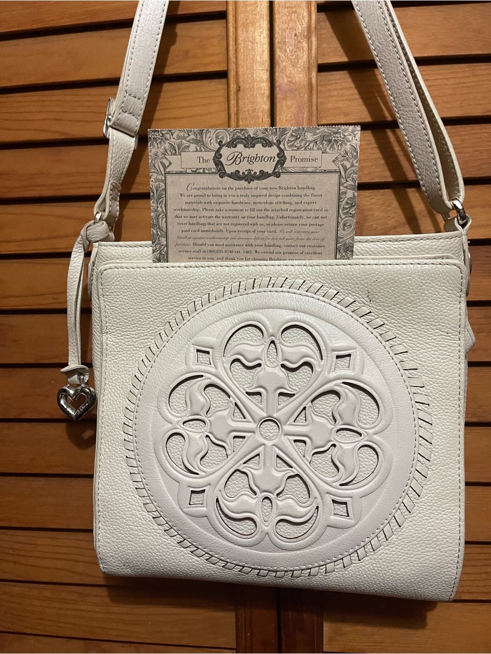 Brighton White Leather Crossbody with Embossed Medallion and Heart Charm